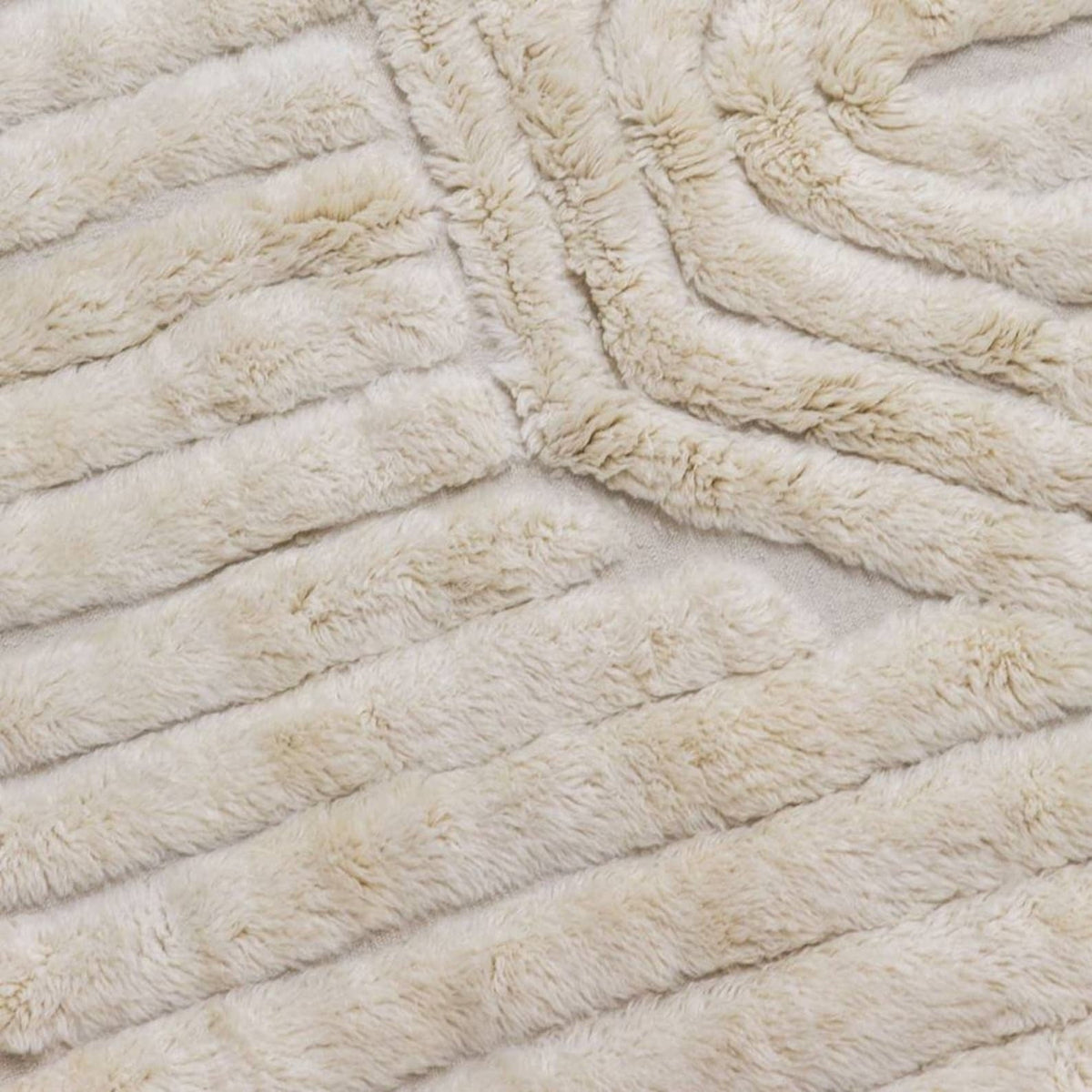 Front view of the off-white textured Moroccan rug with a striped pattern and fringed edges.