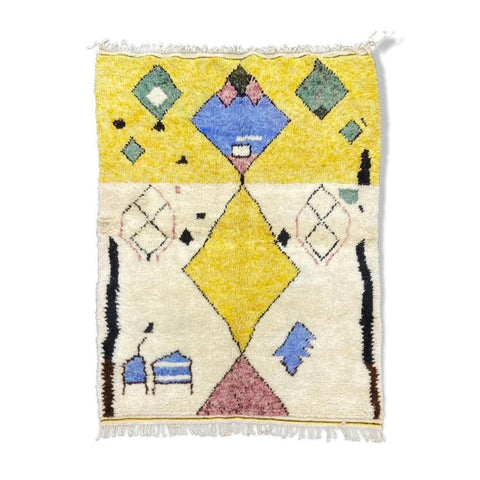 Front view of a blue and yellow tribal Azilal rug featuring geometric patterns.