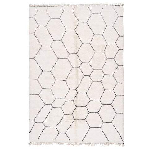 Front view of the black and off-white Beni Ourain Moroccan rug with a hexagonal pattern.