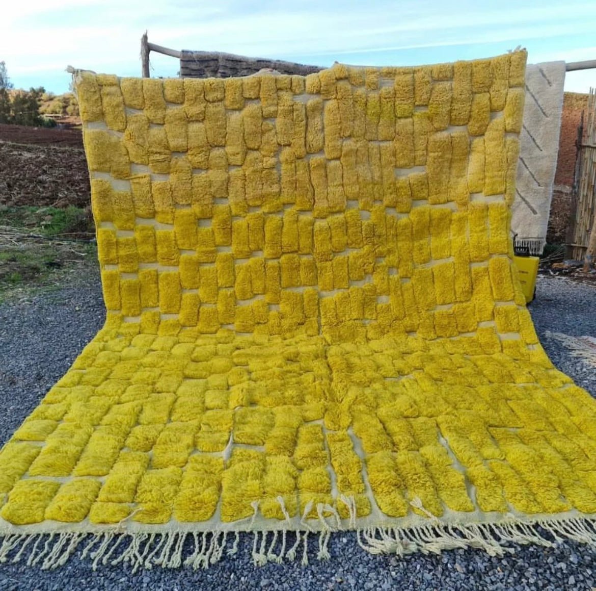 Front view of the yellow Berber rug showcasing its vibrant color and soft texture.